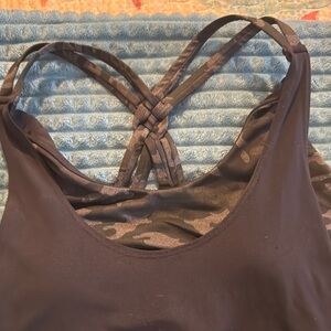 Woman’s workout suit with tank, bra and leggings